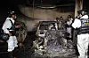 Firefighters inspect an underground parking lot in Incheon where a Mercedes EV caused a fire after an explosion last week. A total of 140 cars were damaged, with 40 of them completely burned. [YONHAP]