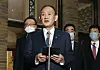 Japan's Prime Minister Yoshihide Suga speaks to the press after having his first phone talk with U.S. President Joe Biden on Thursday. [YONHAP]