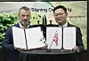 Stephen Fitzpatrick, left, Vertical Aerospace CEO, and Hanwha Aerospace CEO Son Jae-il pose for a photo after signing a memorandum of understanding for an aerial vehicle development project. [HANWHA AEROSPACE]