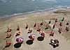 Parasols populate a beach in Busan, spread out two to four meters (6.6 to 13 feet) from one another, on Tuesday, as all beaches in the city prepare to open on Wednesday. [YONHAP]