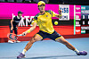Kwon Soon-woo lunges for the ball against Mackenzie McDonald of the United States during their men's singles round of 16 match at the Japan Open in Tokyo on Wednesday. [AFP/YONHAP]
