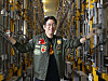 KEIL CEO Kim Young-wook poses by an ″egg tower″ for mealworm cultivation at the company's factory in Osong, North Chungcheong. [PARK SANG-MOON]