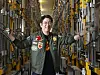 KEIL CEO Kim Young-wook poses by an ″egg tower″ for mealworm cultivation at the company's factory in Osong, North Chungcheong. [PARK SANG-MOON]