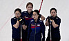From left: Kim Seon-yeong, Kim Cho-hi, Kim Eun-jung and Kim Kyeong-ae wait for their opponents during a curling match against Denmark on Wednesday. [AP/YONHAP]