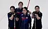 From left: Kim Seon-yeong, Kim Cho-hi, Kim Eun-jung and Kim Kyeong-ae wait for their opponents during a curling match against Denmark on Wednesday. [AP/YONHAP]