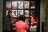 Visitors to Seoul Cinema on the day of its closure take pictures in front of a photo wall displaying posters of some of the hit movies it had screened over the past 42 years. [YONHAP]