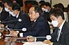 Finance Minister Choo Kyung-ho speaks at a meeting held with chiefs of the Bank of Korea, the Financial Services Commission and the Financial Supervisory Service in central Seoul on Thursday. [YONHAP]