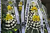 Condolence flowers at Gwanak Police Station in southern Seoul on July 23 honor an inspector surnamed Song, who took his life on July 18 after complaining of an excessive workload. [YONHAP]
