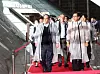 The BIE delegation and Busan Mayor Park Heong-joon, right, walk on the red carpet to attend K-Culture Night on Wednesday night. [YONHAP]
