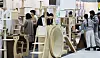 Cat enthusiasts browse a range of products on display at the Nyang Nyang Punch Cat Show at Coex Magok in Gangseo District, western Seoul, on Jan. 26. [YONHAP]