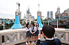 Adults dressed in school uniforms at a local theme park Lotte World in Songpa District, southern Seoul [YONHAP]