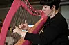 Michelle Paris, currently in Korea with a D-10 visa and hoping the hallyu visa could be a fit for her, plays the harp. [MICHELLE PARIS]