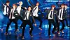Boy band Exo performs 'Growl' (2013) in school-uniform inspired stage clothes [JOONGANG ILBO]