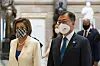 President Moon Jae-in, right, and House Speaker Nancy Pelosi walk through Statuary Hall in the Capitol on Thursday in Washington. [AP]