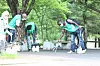 International students at the Park Chung Hee School of Policy and Saemaul pick up trash as part of the graduate school's program mirroring the original Saemaul Movement's traditions. [YEUNGNAM UNIVERSITY]