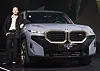 Singer G-Dragon poses with the BMW XM during an unveiling event Tuesday in southern Seoul. [YONHAP]