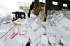 Officials at the public recycling center in Idong-eup, Cheoin District, Yongin in Gyeonggi, are working on sorting styrofoam on Wednesday, the last day of the Chuseok holiday. Holidays leave mountains of styrofoam packaging due to what environmentalists call ″excessive gift-wrapping.″ [YONHAP]