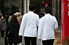 Medical professionals walk near a hospital in Seoul on Tuesday. [NEWS1]
