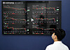 A display at the cryptocurrency exchange Coinone's customer center in Yongsan District, central Seoul, shows the price of bitcoin rising on Tuesday. Bitcoin traded above 57 million won ($48,300) while Ethereum traded at 3.88 million won. Recently there have been growing expectations in the market that the values of cryptocurrency have hit a low and will continue to rise. Ethereum investments in particular have been increasing as it is considered to be relatively less volatile than bitcoin. [YONHAP]