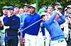 Tom Kim hits his tee shot on the 14th hold during a practice round ahead of The Masters as Rory McIlroy and Tiger Woods look on at the Augusta National Golf Club in Augusta, Georgia on Monday. [REUTERS/YONHAP]
