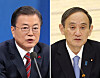 Korea's President Moon Jae-in, left, and Japanese Prime Minister Yoshihide Suga. [YONHAP]