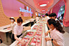 Staff at the Baskin Robbins' Cheongdam branch check out the ice cream flavors on May 15 [NEWS1]