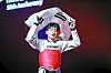 Taekwondo practitioner Bae Jun-seo celebrates with the Korean flag after beating Georgi Gurtsiev 2-0 in the flyweight final of the 2023 World Taekwondo Championships at Baku Crystal Hall in Baku, Azerbaijan on Tuesday. Bae's gold medal is Korea's first in this year's tournament and his first since the 2019 World Championships. [YONHAP]