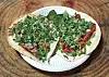 The two mainstays on the Taqueria Stan menu, pork shoulder, left, and chorizo, topped with diced white onions, salsa verde and cilantro. [PARK SANG-MOON]