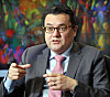 Colombian Ambassador to Korea Juan Carlos Caiza speaks to the Korea JoongAng Daily on Monday at the embassy in Seoul. In addition to discussing bilateral projects upcoming for the 60th anniversary of bilateral ties next year, the ambassador spoke of several cultural exchanges and events planned through this year, including an upcoming exhibition by Colombian artist Carlos Jacanamijoy, whose painting can be seen in the background of the photo, in Seoul in April. [PARK SANG-MOON]
