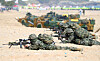 South Korean Marines take part in the ongoing South Korea-U.S. Ssangyong amphibious landing exercise on a beach in Pohang, North Gyeongsang on Wednesday. [YONHAP]