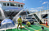 An emergency drill simulating an electric vehicle fire aboard a passenger ship is underway at Tongyeong Port Terminal in South Gyeongsang on Sept. 11. Eleven agencies, including Gyeongnam, the Masan Regional Office of Oceans and Fisheries and the city of Tongyeong, participated. [MASAN REGIONAL OFFICE OF OCEANS AND FISHERIES]