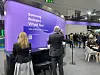 Visitors participate in a virtual reality program to look at Samsung Biologics’ third manufacturing plant in the company’s booth at CPhI Worldwide 2021 Tuesday. [SARAH CHEA]