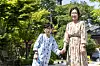 Yoon San, left, and his mother Lim pose for a photograph in front of Seoul National University Hospital in central Seoul on Thursday. [JANG JIN-YOUNG]