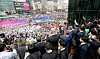 The Bureau International des Expositions delegation waves to about 5,500 Busan residents who showed up at Busan Station to greet the inspection team on Tuesday. [YONHAP]