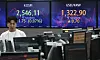 A screen in Hana Bank's trading room in central Seoul shows stock and foreign exchange markets open on Wednesday. [NEWS1]