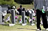 People visit the May 18th National Cemetery in Gwangju on Sunday, four days ahead of the 43rd anniversary of the May 18 Gwangju Democratization Movement on Thursday. [YONHAP]