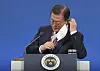 President Moon Jae-in taking off his mask at the start of the press conference hosted on Monday at the Blue House. A limited number of reporters were present at the conference, with many joining it virtually over coronavirus concerns. [JOINT PRESS CORPS OF THE BLUE HOUSE]