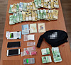 Illegal drugs and money made from illegal sale of drugs in Korea confiscated by the police in Incheon. [INCHEON METROPOLITAN POLICE]