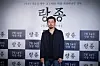 Director-turned-producer Na Hong-jin poses at the press event of 'The Medium' at CGV Yongsan, central Seoul. [SHOWBOX]