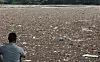 Trash swept downstream by torrential rains clogs the surface of Paldang Lake near Paldang Dam in Hanam, Gyeonggi, on July 22. [YONHAP]