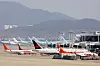 Airplanes on the tarmac at Incheon International Airport on Monday. There are growing concerns among the budget airlines as government subsidies for furloughs in hopes of preventing layoffs end this month. The subsidy was implemented in 2020 as the Covid-19 outbreak hit the airlines hard, especially budget carriers. The industry is hoping that the government will extend the subsidy as the pandemic situation continues on with a surge in people infected with the Omicron variant. [YONHAP]