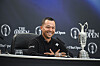 Xander Schauffele smiles next to the Claret Jug trophy during a press conference following his two stroke victory in the final round of the 152nd Open Championship at Royal Troon on July 21 in Troon, Scotland. [GETTY IMAGES]
