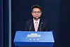 Lee Cheol-hee, newly appointed presidential secretary for political affairs, talks to reporters on Friday at the Blue House Press Center. [YONHAP]