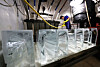 An employee at Daewon Cold Storage Industrial, which specializes in industrial-sized refrigerators, works on ice blocks in Bucheon, Gyeonggi, on Monday. The temperature outside has been rising, and the average midday temperature in Seoul on Sunday exceeded 35 degree Celsius (95 degrees Fahrenheit). [YONHAP]