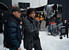 Director Bong Joon-ho, right, works on the set of his upcoming film, ″Mickey 17,″ in this file photo provided by Warner Bros. Korea on March 14. [WARNER BROS KOREA]