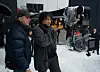 Director Bong Joon-ho, right, works on the set of his upcoming film, ″Mickey 17,″ in this file photo provided by Warner Bros. Korea on March 14. [WARNER BROS KOREA]