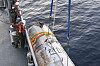 South Korea’s military retrieves part of the sunken North Korean satellite launch vehicle from the Yellow Sea after 15 days of salvage operations Thursday evening, in a photo released by the Joint Chiefs of Staff Friday. [NEWS1]