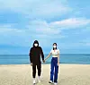 Singer and actor Kim Yoon-ji, also known as NS Yoon-G, posts a photo of herself with her groom-to-be on the beach to announce her plan to get married in September. [SCREEN CAPTURE]