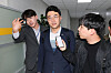Democratic Party lawmaker Kim Nam-kuk, center, is questioned by reporters about his cryptocurrency investments as he leaves the National Assembly in Yeouido, western Seoul on Tuesday afternoon. [YONHAP]