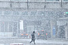 A person walks near Incheon International Airport on Thursday, as heavy snow was forecast to hit central regions of the country, including Seoul and some parts of the Gyeonggi, Gangwon and North Chungcheong regions. Eastern parts of Gyeonggi, central and southern inland areas of Gangwon, and northern parts of North Chungcheong may see over 10 centimeters of snow, according to the Korea Meteorological Administration. Snow will stop in Seoul in the afternoon, and by night for most parts of the country. [YONHAP]